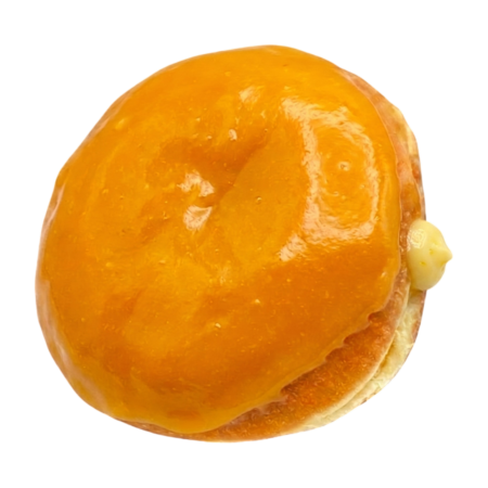 Donut filled with lemon whipped cream and dipped in a mango glaze