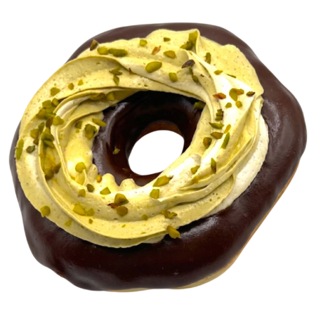 chocolate dipped and topped with pistachio whipped cream donuts from machino donuts